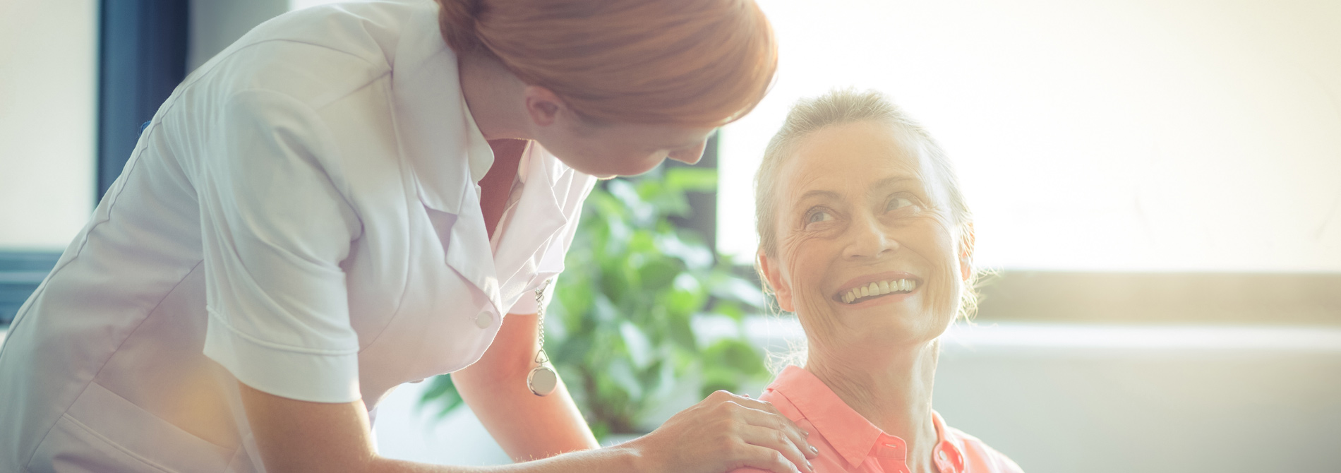 Nurse checking in on patient at the Older Adult unit at Hanley Center.