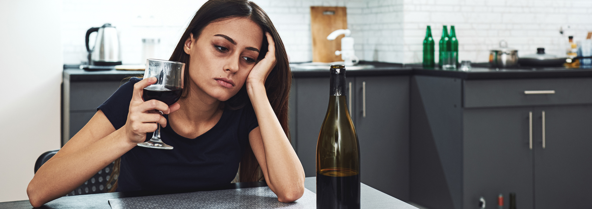 depressed woman drinking alcohol