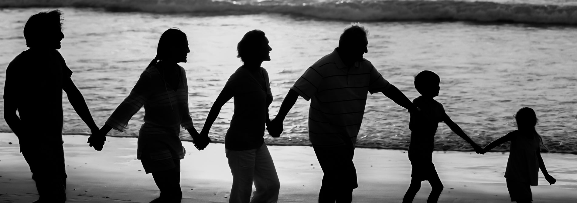 family walking on beach