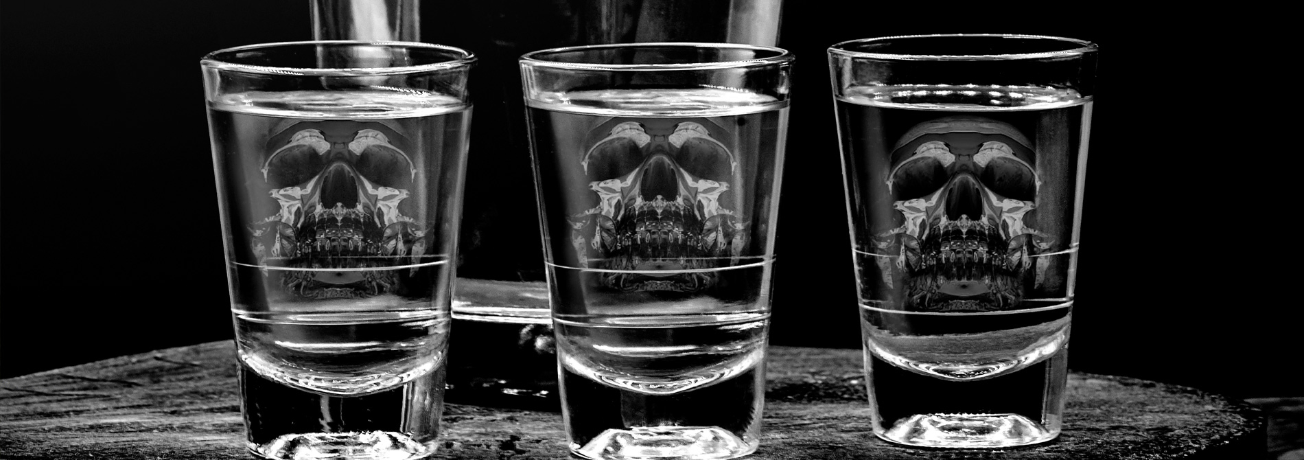 shot glasses with skulls in them depicting death