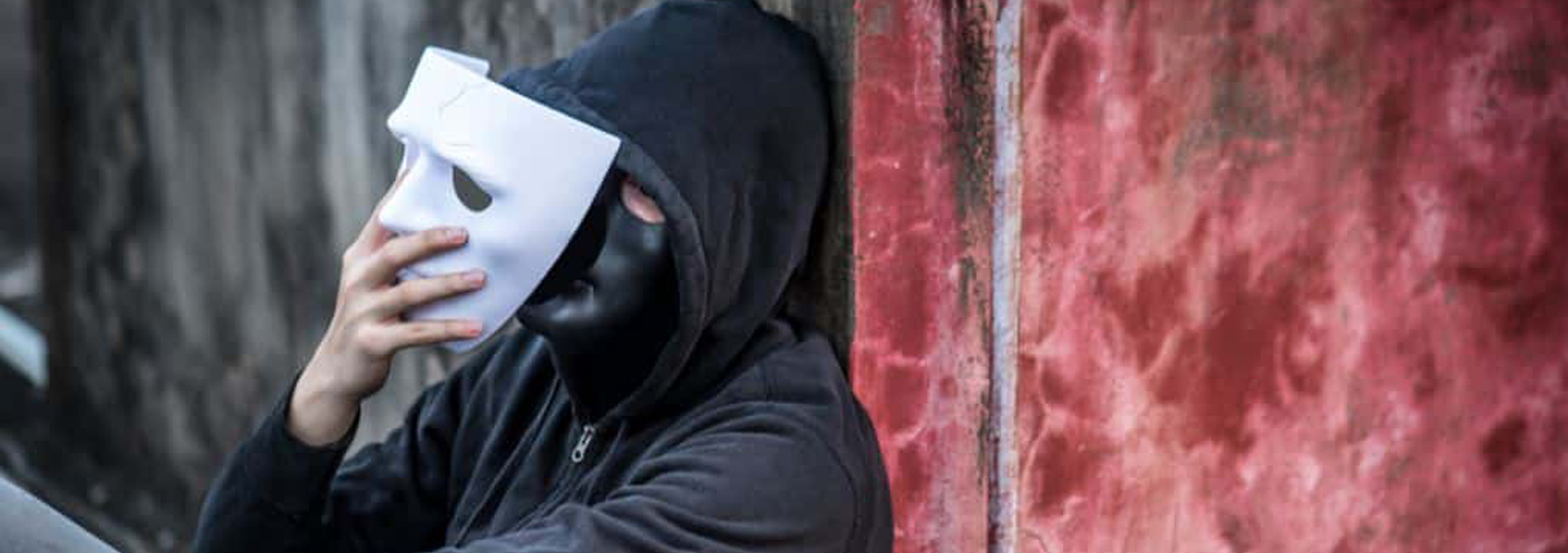 Man with multiple masks on face