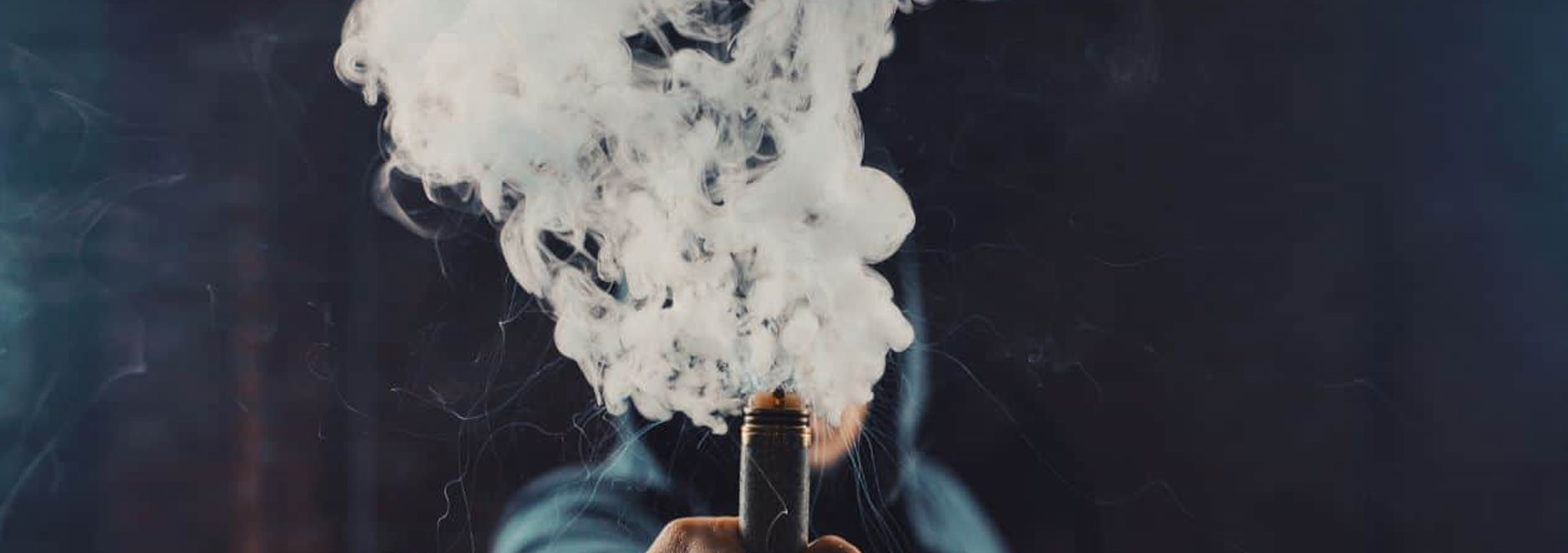 Vape cloud blocking out person's face